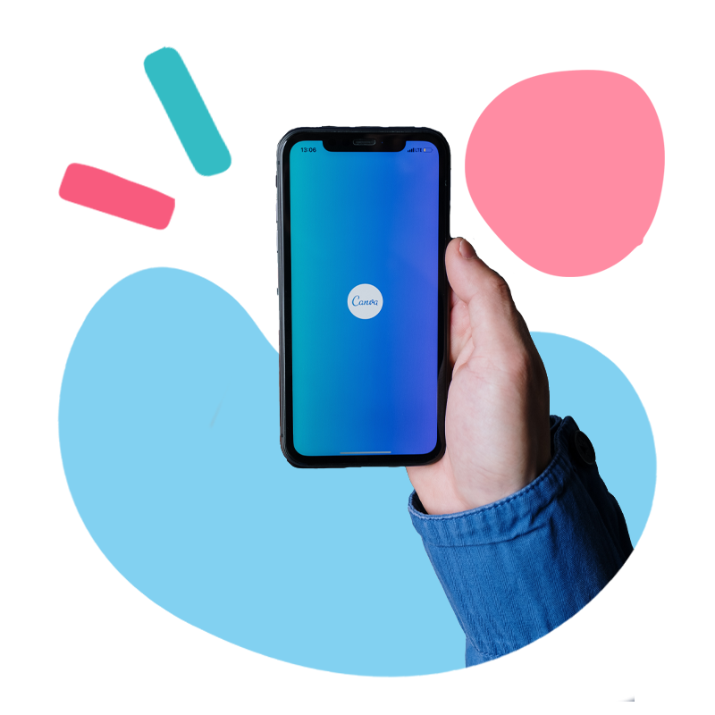 Hand holding a phone with the Canva logo