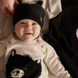 Image showing the Ear-Resistible Knitted Hat, 0 - 6 Months, Black product.