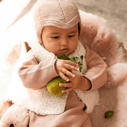 Image showing the Wrigglemat Sheepskin Snuggle Playmat, Rose product.