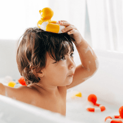 Image showing the Flo The Floatie Duck Natural Rubber Bath Toy, Yellow product.
