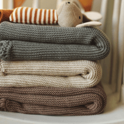 Image showing the Scallop Knitted Blanket, Stone product.