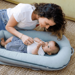 Image showing the Deluxe+ Dock Printed Baby Nest, Marine Chambray product.