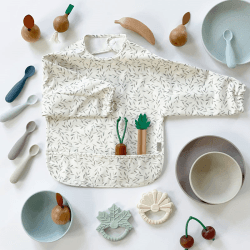 Image showing the Recycled Polyester Sleeved Bib with Print, Green Leaves product.