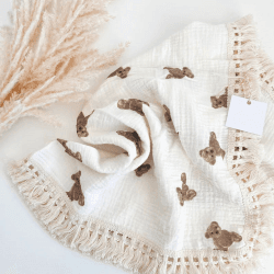 Image showing the The Bear Muslin Frill Blanket Swaddle, 100 x 120cm, Cream product.