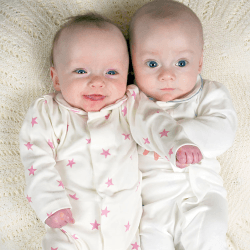 Image showing the Stars Magnetic Fastening Sleepsuit Onesie, 3 Months, Raspberry Pink product.
