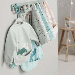 Image showing the Happy Dots Long Sleeved Pocket Bib, Powder product.