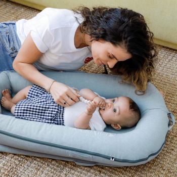 Image showing the Deluxe+ Dock Printed Baby Nest, Marine Chambray product.
