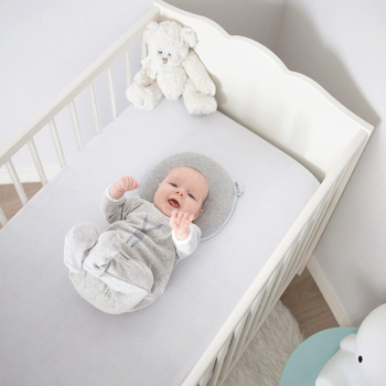 Image showing the Lovenest Round Anti Flat Head Baby Pillow product.
