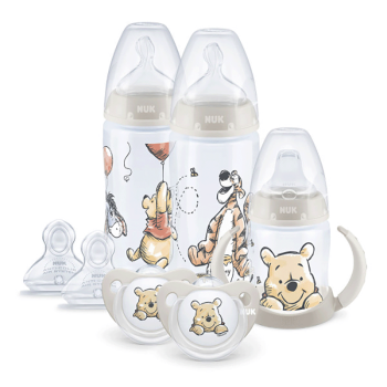 Image showing the Disney 8 Piece Winnie The Pooh Baby Bottle Set, Ivory product.