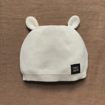 Image showing the Ear-Resistible Knitted Hat, One Size, Natural White product.